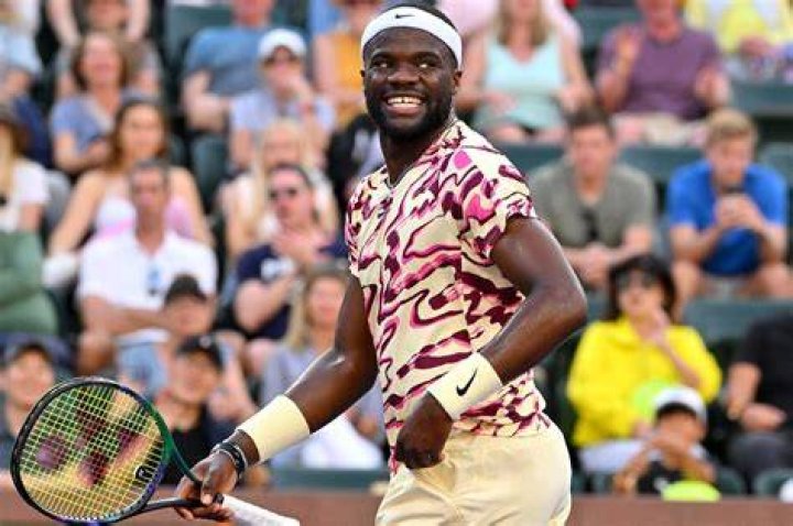 Frances Tiafoe celebrates
