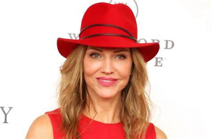 Tricia Helfer in Bathing Suit Says "Pool Season Has Started" — Celebwell
